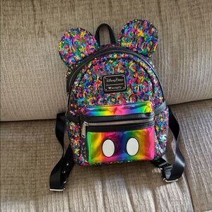 Disney lounge fly Multicolor Sequin retired backpack APX 11 x 8 gently used